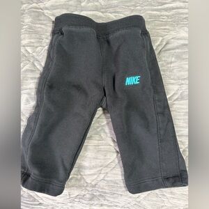 Nike Baby Black Sweatpants with Teal Logo